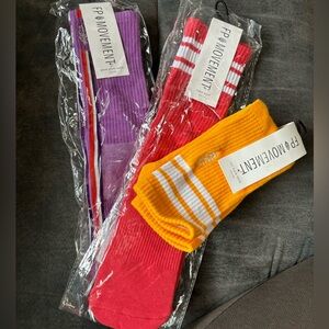 Free people movement logo stripe tube socks